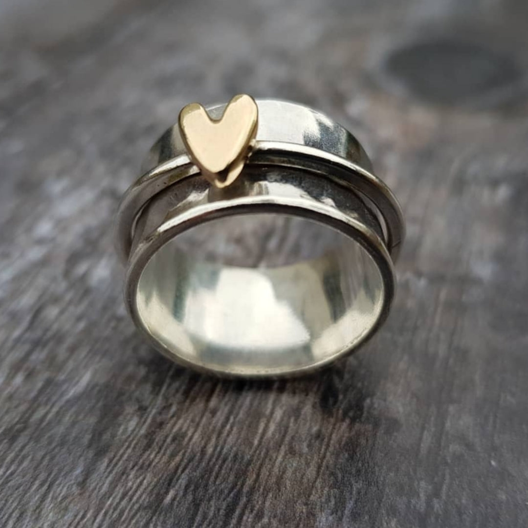 Bague argentée avec cœur doré