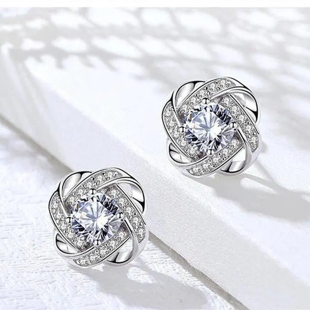 Boucles d'Oreilles - Spirale Florale Cristallée, mise en situation
