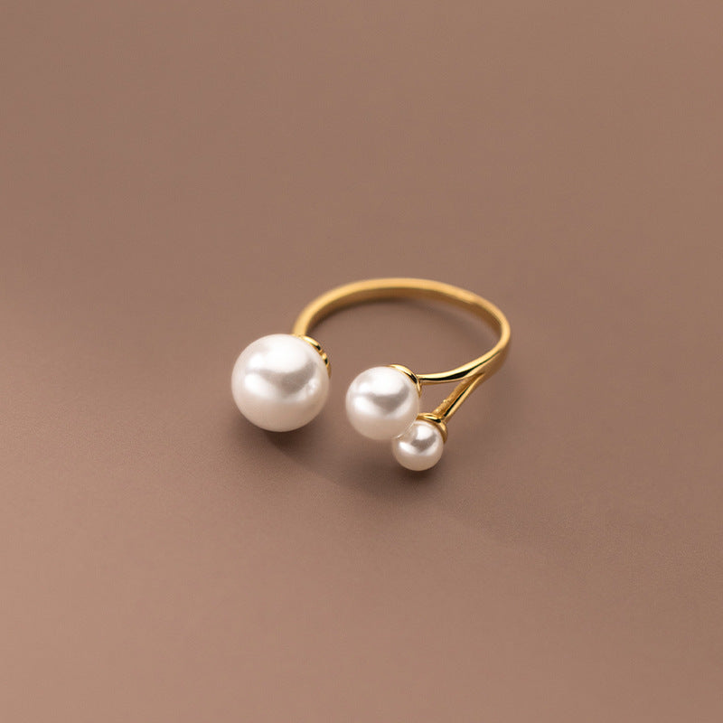 Bague trio de perles dorée