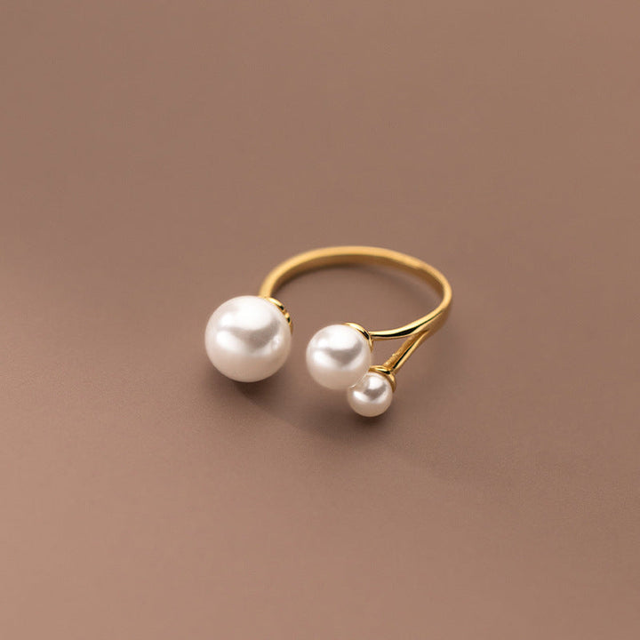 Bague trio de perles dorée