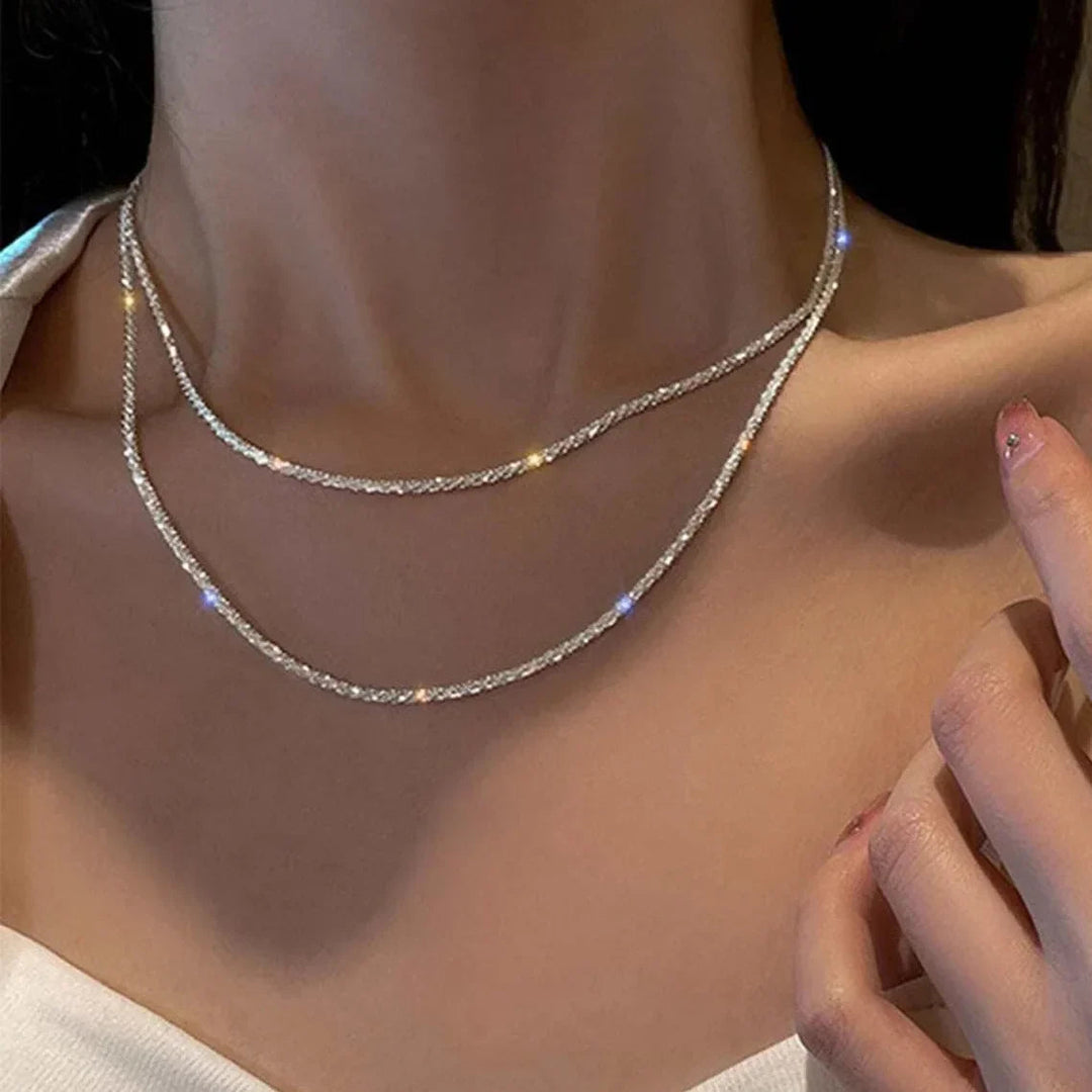Collier double rang avec pierres scintillantes