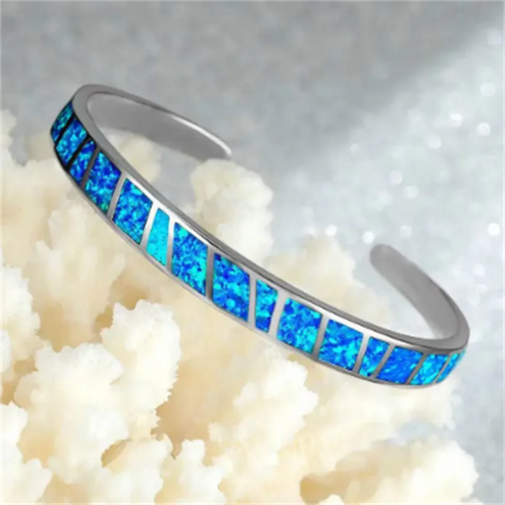 Bracelet argenté ajustable reflets d'opale bleue