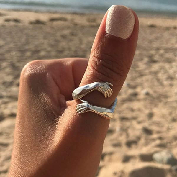 Bague étreinte argentée réglable