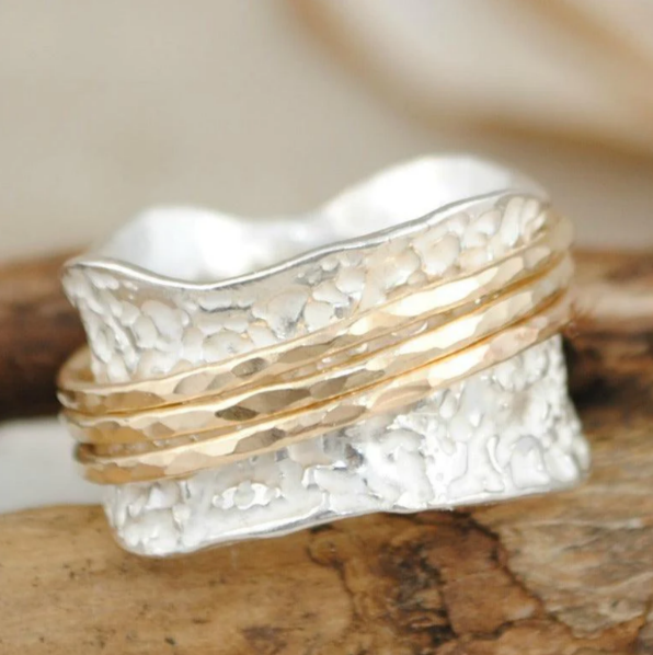Bague tournante or et argent
