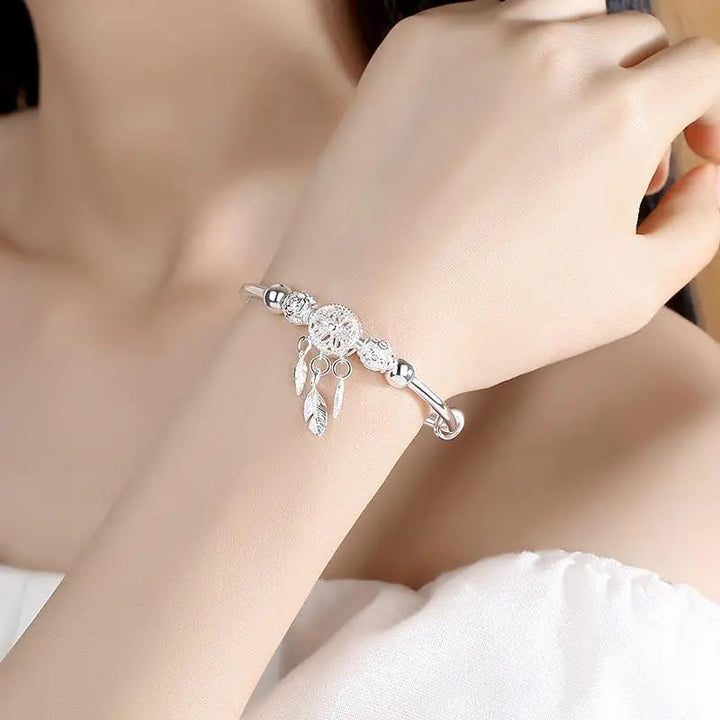Bracelet argenté avec pendentif attrape-rêves